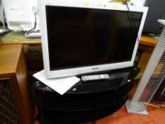 Panasonic TX-L32D 28BW LCD TV and modern curved three shelf stand E/T