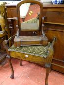 Upholstered piano stool and a small toilet mirror