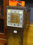 Polished wood grandmother clock