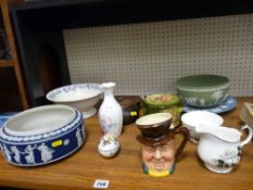Large parcel of porcelain including Johnny Weller character jug, green and other coloured Wedgwood