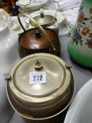 Two polished and a porcelain biscuit barrel