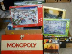 Two boxes of jigsaws and board games, most in original packing and unopened