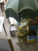 Modern Oriental style lamp with shade on a brass tripod stand E/T