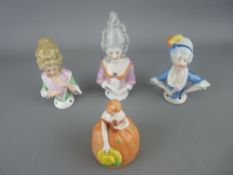 Three porcelain pin cushion dolls and a dainty lady candle snuffer