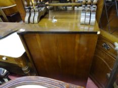 Mahogany two door shaped cupboard