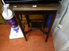 Small octagonal occasional table with lower centre square shelf