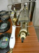 Two 20th Century ceramic top bar pulls/pumps