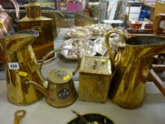 Oriental brass and champleve enamel decorated tea kettle, a repousse brass tea canister and two