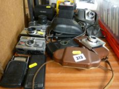 Collection of vintage cameras and equipment, various makers