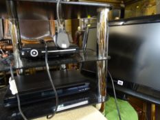 Hitachi LCD TV, Tevion DVD player and Humax FreeSat box along with a black glass and chrome stand