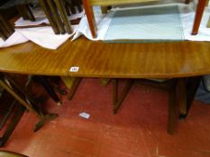 Large extending dining table, four chairs and a sideboard with G-Plan gold label