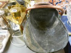 Antique copper coal scuttle and a vintage style brass lamp