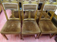 Six oak dining chairs