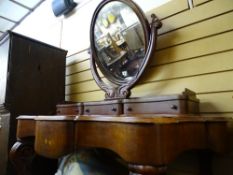 Victorian mahogany Duchess dressing table having an oval mirror