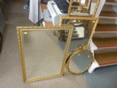 Four gilt framed wall mirrors
