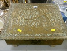 Repousse brass decorated slipper box