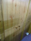 Pair of wood effect melamine wardrobes, matching four drawer dressing table and a pair of two over