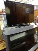 Bush LED TV and modern black glass and chrome stand E/T