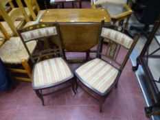Compact barley twist gate leg table and two inlaid and classically upholstered bedroom chairs