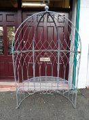 Metal garden pagoda style arch with seat