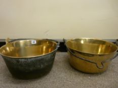 Two vintage brass jam pans with iron swing handles