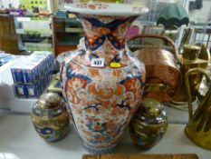 Large Imari vase and a pair of Satsuma ginger jars and covers (vase damaged)