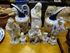 Pair of Victoria Carlsbad Austria jugs, three items of parian ware and three decorative figurines