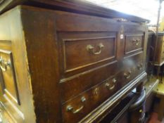 Antique pine lidded chest on stile supports containing quantity of curtains etc