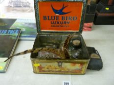 Tin containing vintage inkwells and other desktop items etc