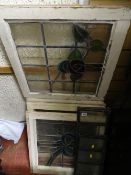 Parcel of four wooden frames with lead and stained glass panels and four other smaller leaded opaque
