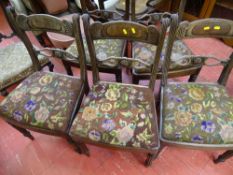 Parcel of five Regency dining chairs with floral tapestry seat pads