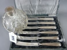 Cased set of butter knives with hallmarked silver handles and a cut glass scent bottle with silver