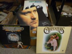Box of vintage LP records, various artists including Phil Collins, The Platters, classical and