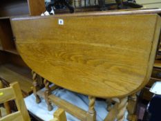 Light wood barley twist gate leg table