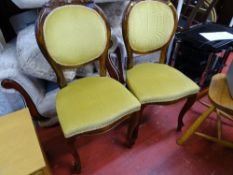 Pair of mustard upholstered dining chairs