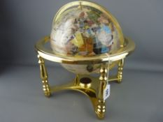 Modern table globe on brass stand, the globe in mother of pearl effect with semi-precious stone