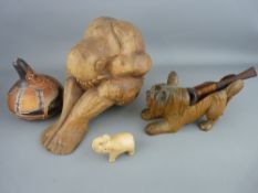 Carved figure of a man in curled up pose, decorated nut, probably German carved terrier pipe