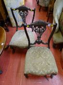 Pair of matching parlour chairs with pierced carved backs