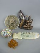 Cast roundel titled 'Maya', an amber type figure of a seated man, a carved possibly jade knife