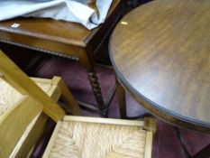 Hall table barley twist supports and a circular occasional table with carved detail to the
