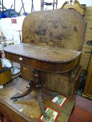 Antique mahogany foldover tea table