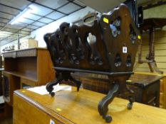 Rosewood carved magazine rack on castors