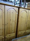 Pair of pine wardrobes and a multi drawer chest