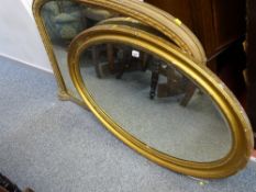 Large overmantel mirror and a large oval bevelled edge mirror