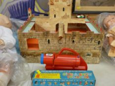 Vintage toy fort and a Chad Valley toy projector with a box of slides