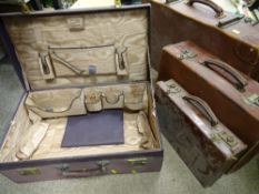 Three leather suitcases and a good Finnegan's travelling case (no containers)