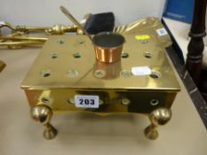 Heavy quality miniature brass footman and a miniature copper saucepan