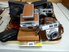 Vintage SLR cameras to include a Kodak Retinette, two Zorki-4, Zorki-4K, Canon Canonette, Polaroid