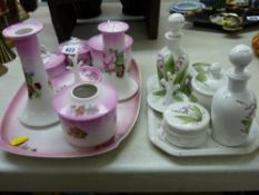 Two vintage china dressing table sets