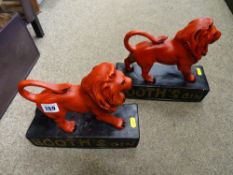 Pair of Booths Gin rampant lion advertising blocks